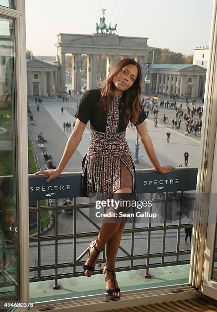 Naomie Harris stands with the Brandenburg Gate behind during a photocall prior the German premiere of the new James Bond movie 'Spectre' at Hotel...