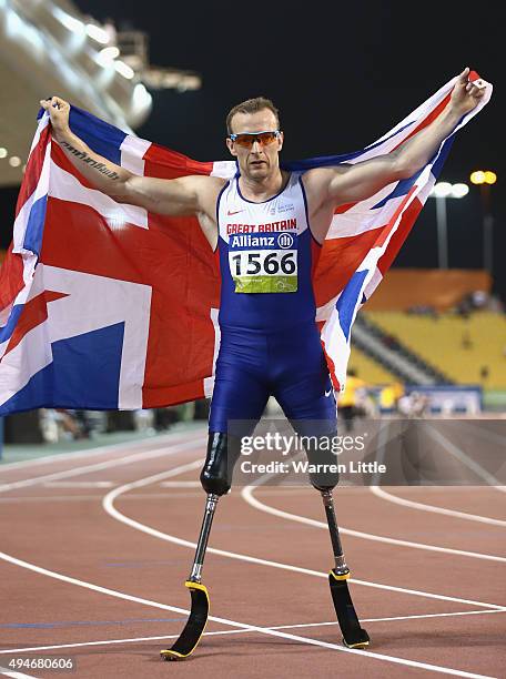Richard Whitehead of Great Britain celebrates his world record and winning the men's 200m T42 final during the Evening Session on Day Seven of the...