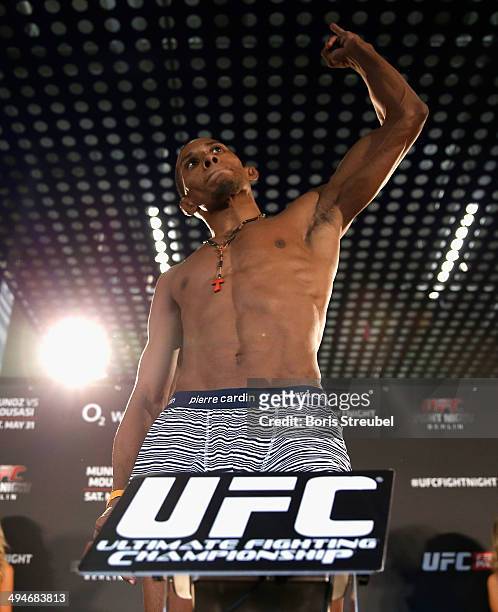Iuri Alcantara poses on the scale during the UFC weigh-in at O2 World on May 30, 2014 in Berlin, Germany.