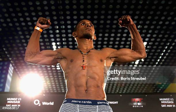 Iuri Alcantara poses on the scale during the UFC weigh-in at O2 World on May 30, 2014 in Berlin, Germany.