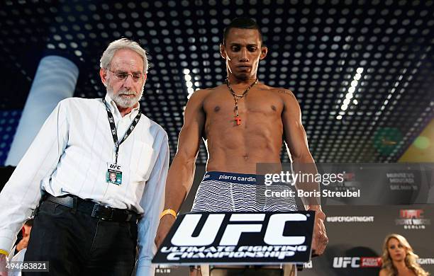 Iuri Alcantara steps on the scale during the UFC weigh-in at O2 World on May 30, 2014 in Berlin, Germany.