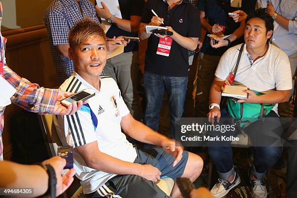 Yoshito Okubo of Japan speaks to the press during a media session at the Hyatt Regency Clearwater Beach Resort and Spa on May 30, 2014 in Clearwater,...