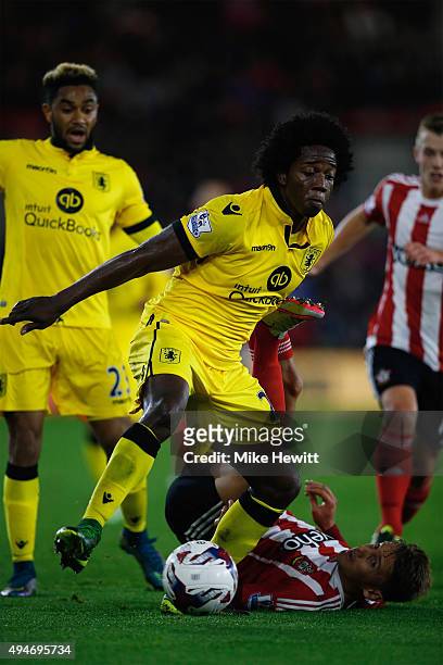 Carlos Sanchez of Aston Villa wins the ball from Gaston Ramirez of Southampton during the Capital One Cup Fourth Round match between Southampton v...
