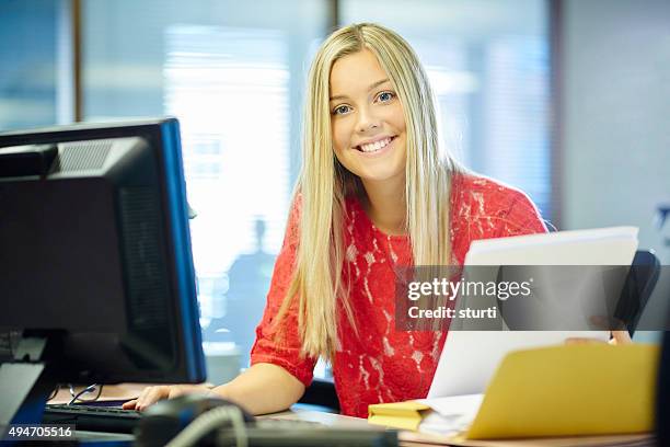 young female office worker - girl using computer stock pictures, royalty-free photos & images