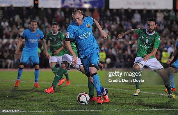 Jeremy Mathieu of FC Barcelona lines up a shot at goal during of the Copa del Rey Last of 16 First Leg match between C.F. Villanovense and F.C....