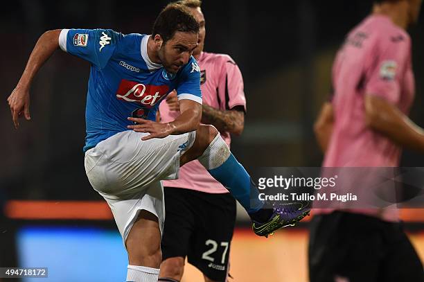 Gonzalo Higuain of Napoli scores the opening goal during the Serie A match between SSC Napoli and US Citta di Palermo at Stadio San Paolo on October...