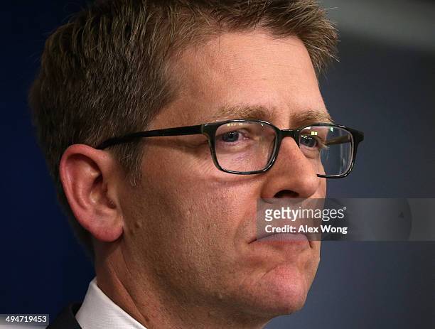 White House Press Secretary Jay Carney listens to a question during the White House daily briefing 2014 in the James Brady Press Briefing Room May...
