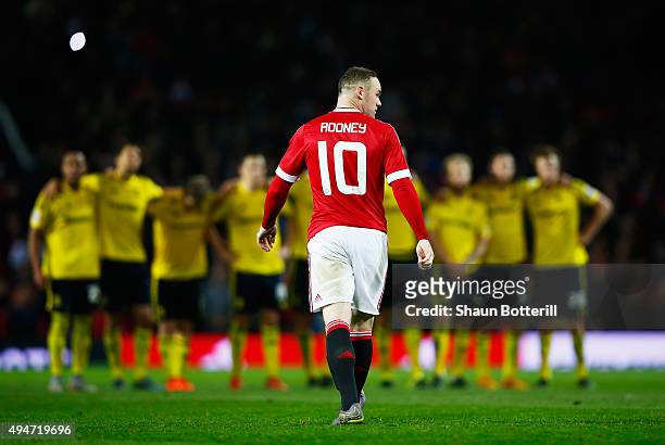 Wayne Rooney of Manchester United looks dejected after failing to score in the penalty shoot out during the Capital One Cup Fourth Round match...