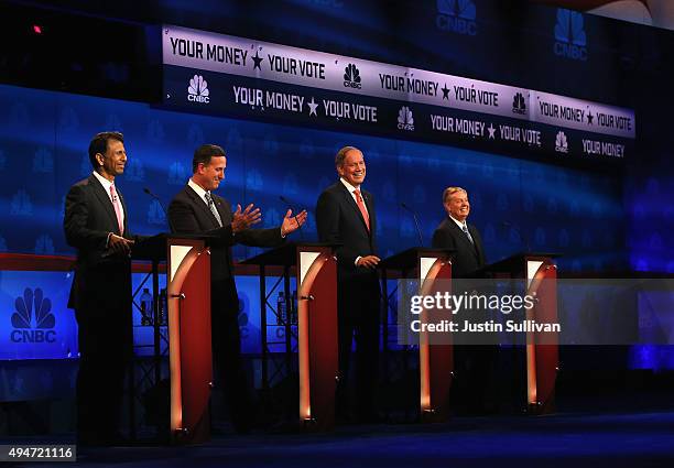 Presidential candidates Louisiana Governor Bobby Jindal , Rick Santorum, George Pataki, and Sen. Lindsey Graham take part in the CNBC Republican...