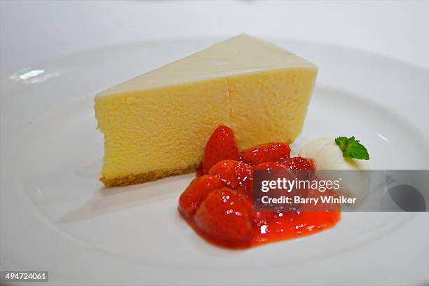yellow cheesecake, red strawberries, white cream - whip cream dollop stock pictures, royalty-free photos & images
