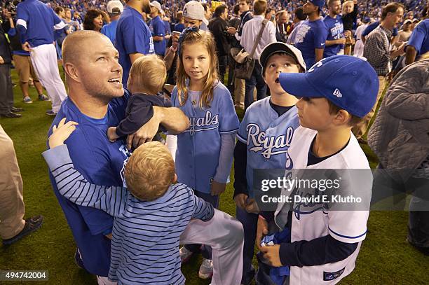 PLayoffs: Kansas City Royals Ryan Madson victorious on field with his children after winning Game 6 and series vs Toronto Blue Jays at Kauffman...
