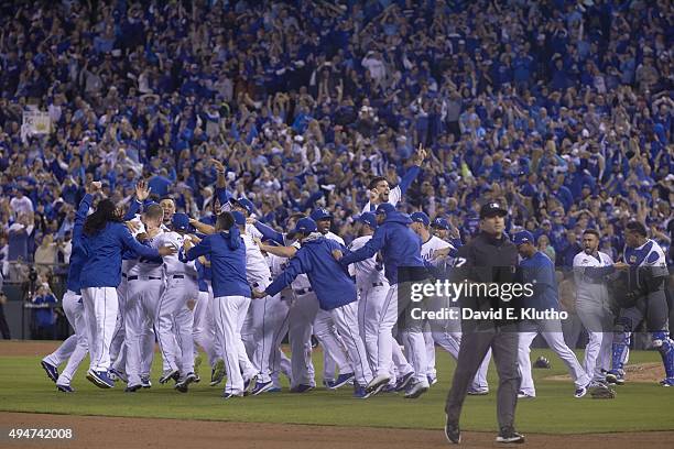 PLayoffs: Kansas City Royals Eric Hosmer victorious with teammates after winning Game 6 and series vs Toronto Blue Jays at Kauffman Stadium. Kansas...