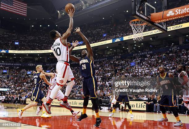 DeMar DeRozan of the Toronto Raptors shoots the ball as Ian Mahinmi of the Indiana Pacers defends during the NBA season opener at Air Canada Centre...