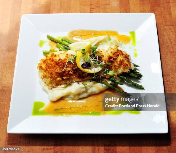 Baked Haddock with buttery crumbs and lobster veloute sauce with