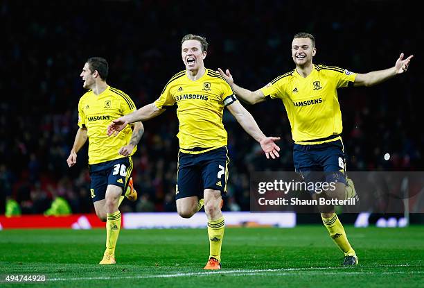 Bruno Zuculini, Grant Leadbitter and Ben Gibson of Middlesbrough celebrate victory after the penalty shoot out during the Capital One Cup Fourth...