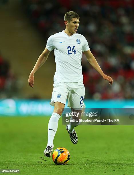 John Stones of England in action during the International Friendly match between England and Peru at Wembley Stadium on May 30, 2014 in London,...