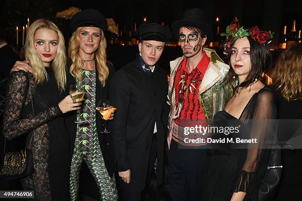 Victoria Louise Ramsey, guest, Fletcher Cowan, Otis Ferry and guest attend the Veuve Clicquot Widow Series "A Beautiful Darkness" curated by Nick...