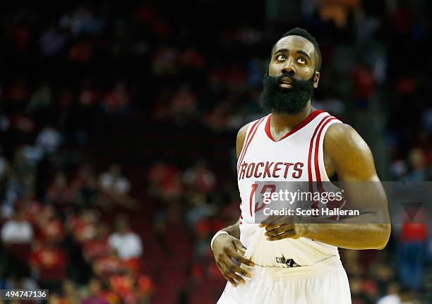 James Harden of the Houston Rockets walks off the court late in their game against the Denver Nuggets at the Toyota Center on October 28, 2015 in...