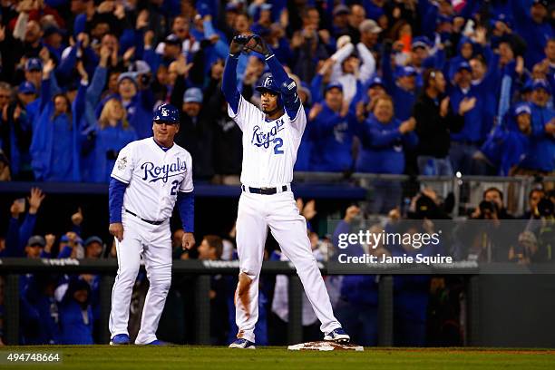 Alcides Escobar of the Kansas City Royals reacts after hitting an RBI triple to score Alex Gordon of the Kansas City Royals in the eighth inning...