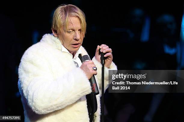 Ben Becker performs at the 'Red Ribbon Celebration Concert - United in Difference' at Burgtheater on May 30, 2014 in Vienna, Austria.