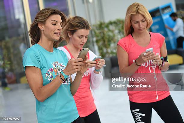 Martina Colombari, Elena Barolo and Federica Fontana attend We Own The Night - Milan Women's 10km Run on May 30, 2014 in Milan, Italy.