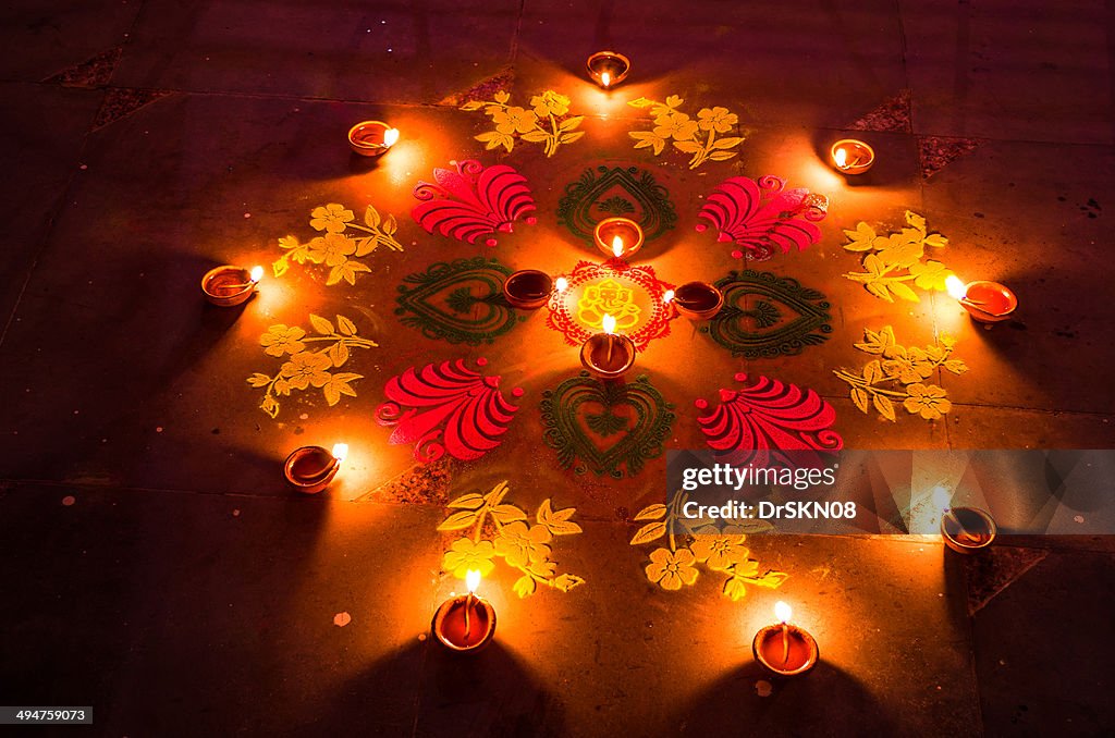Rangoli And Candles In Diwali Nights High-Res Stock Photo - Getty Images