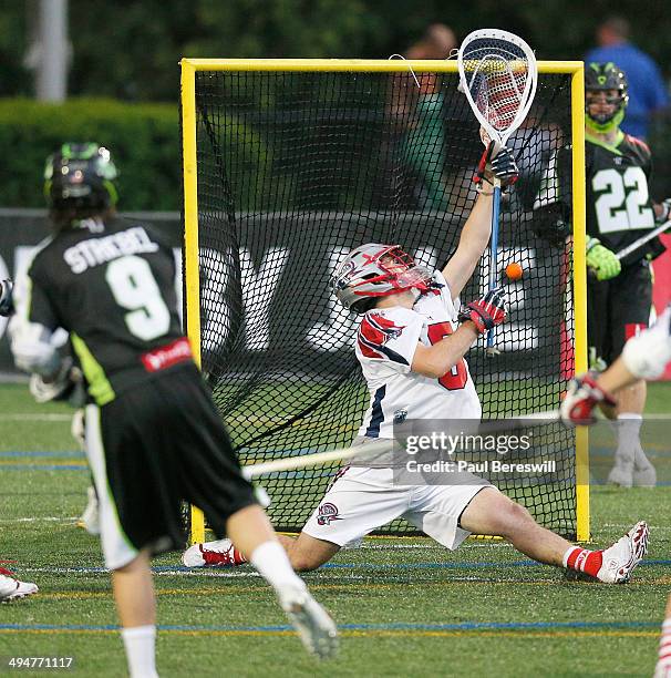 Goalie Jordan Burke of the Boston Cannons can't make a save on this shot by Matt Striebel of the New York Lizards for goal in the first half of a...