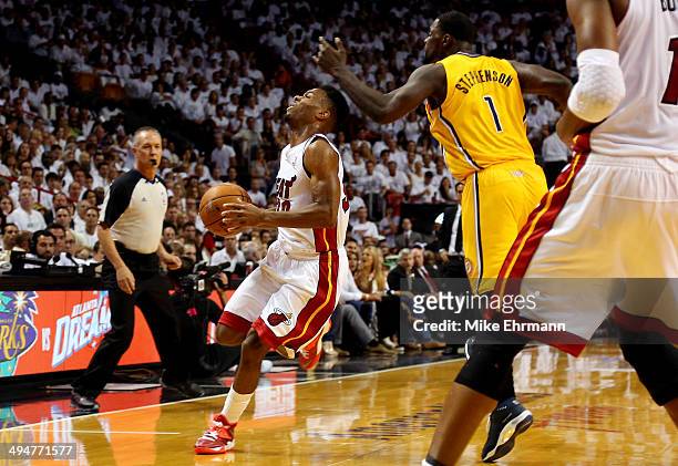 Norris Cole of the Miami Heat is hit in the face by Lance Stephenson of the Indiana Pacers during Game Six of the Eastern Conference Finals of the...