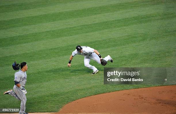 Gordon Beckham of the Chicago White Sox throws out Everth Cabrera of the San Diego Padres during the third inning on May 30, 2014 at U.S.Cellular...