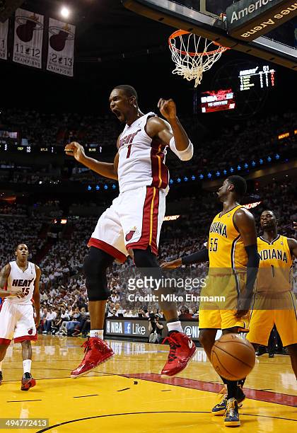 Chris Bosh of the Miami Heat dunks against the Indiana Pacers during Game Six of the Eastern Conference Finals of the 2014 NBA Playoffs at American...