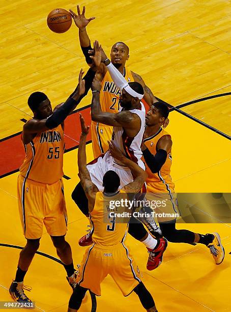 LeBron James of the Miami Heat passes against the Indiana Pacers during Game Six of the Eastern Conference Finals of the 2014 NBA Playoffs at...