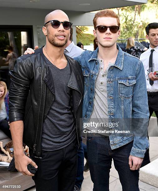 Actors Kendrick Sampson and Cameron Monaghan attend the Vince Camuto Mens exclusive preview at the home of Ashlee Margolis on October 28, 2015 in...