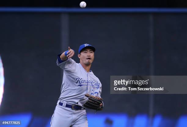 Norichika Aoki of the Kansas City Royals warms up in right field between innings during MLB game action against the Toronto Blue Jays on May 30, 2014...