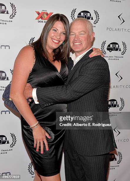 Ruve Robertson and actor Neal McDonough attend the 15th Annual Golden Trailer Awards at Saban Theatre on May 30, 2014 in Beverly Hills, California.