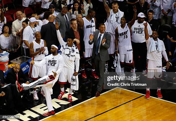 LeBron James of the Miami Heat celebrates against the Indiana Pacers during Game Six of the Eastern Conference Finals of the 2014 NBA Playoffs at...