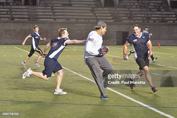 Professional football player Tedy Bruschi attends the Tom Brady Football Challenge for the Best Buddies Challenge: Hyannis Port at Harvard University...