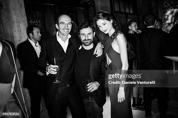 Maurizio Bracca, Marco Lucarelli and Lucrezia Ferrari attends Muse The Travel Issue Dinner at Segheria Di Carlo E Camilla on October 28, 2015 in...