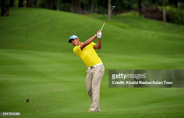 Arie Irawan of Malaysia plays a shot during round one of the CIMB Classic at Kuala Lumpur Golf & Country Club on October 29, 2015 in Kuala Lumpur,...