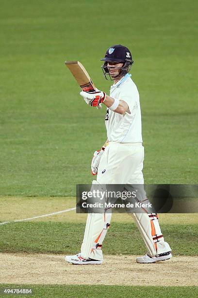 Steven Smith of the Blues celebrates reaching 50 runs during day two of the Sheffield Shield match between South Australia and New South Wales at...