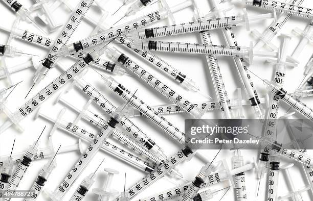 recreational drug and inoculation syringes - needle stock pictures, royalty-free photos & images