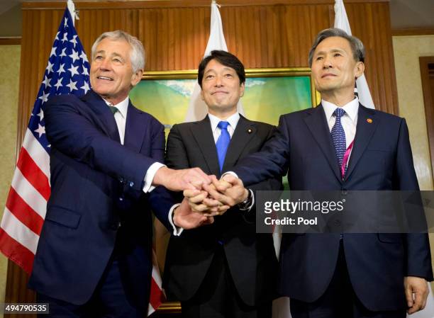 Defense Secretary Chuck Hagel meets with South Korean Defense Minister Kim Kwan-jin and Japanese Defense Minister Itsunori Onodera May 31, 2014 in...