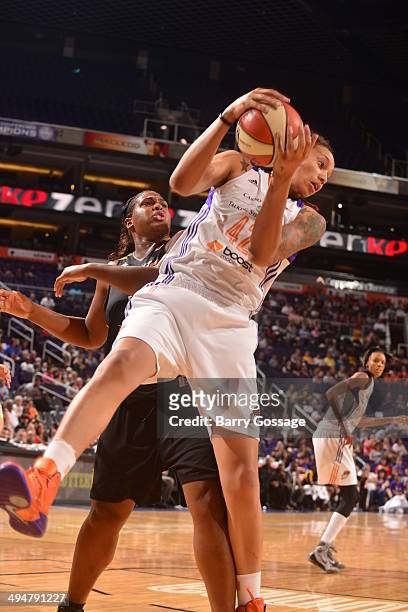 Brittney Griner of the Phoenix Mercury grabs a rebound against the Tulsa Shock on May 30, 2014 at US Airways Center in Phoenix, Arizona. NOTE TO...