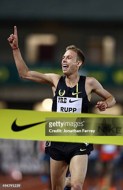 Galen Rupp of USA celebrates setting an American record of 26:44:36 after winning the 10,000m during day 1 of the IAAF Diamond League Nike...
