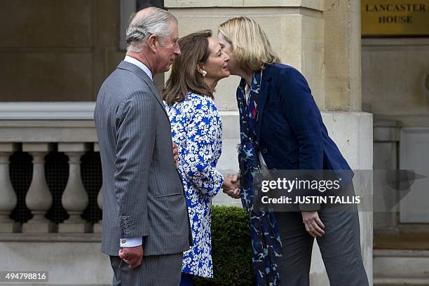 French minister for Ecology, Sustainable Development and Energy, Segolene Royal , and Britain's Prince Charles, Prince of Wales , meet with British...