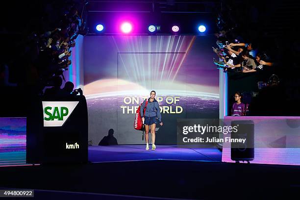 Flavia Pennetta of Italy walks out onto the court prior to her round robin match against Maria Sharapova of Russia during the BNP Paribas WTA Finals...