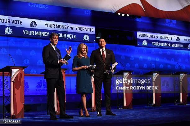 Debate moderators John Harwood , Becky Quick and Carl Quintanilla take the stage at the third Republican Presidential Debate hosted by CNBC, October...