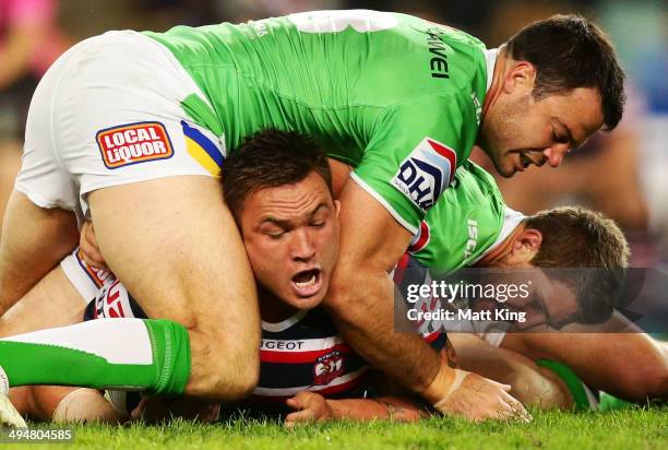 Jared Waerea-Hargreaves of the Roosters is tackled during the round 12 NRL match between the Sydney Roosters and the Canberra Raiders at Allianz...