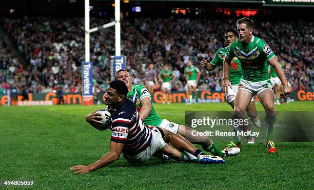 Daniel Tupou of the Roosters scores a try during the round 12 NRL match between the Sydney Roosters and the Canberra Raiders at Allianz Stadium on...