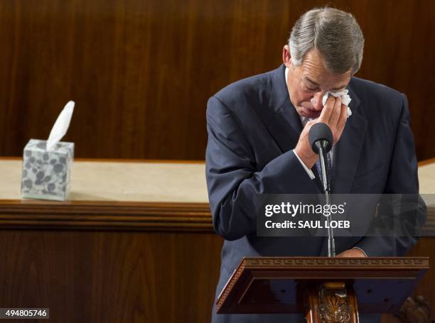 Outgoing Speaker of the House John Boehner, Republican of Ohio, wipes his eyes as he gives a farewell speech from the House floor at the US Capitol...