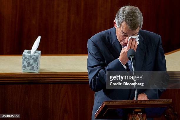 House Speaker John Boehner, a Republican from Ohio, wipes his eyes as he gives a farewell speech during a House Speaker election at the U.S. Capitol...